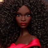 Mattel Barbie Signature Sammlerpuppe zum 45. Jubiläum von Black Barbie  in rotem Kleid von Kitty Black Perkins