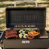 Masterbuilt Tragbarer Holzkohlegrill und Smoker schwarz, mit Scherenwagen