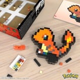 Mattel MEGA Pokémon Glumanda Bauspielzeug-Set für Sammler, Konstruktionsspielzeug 349 Teile